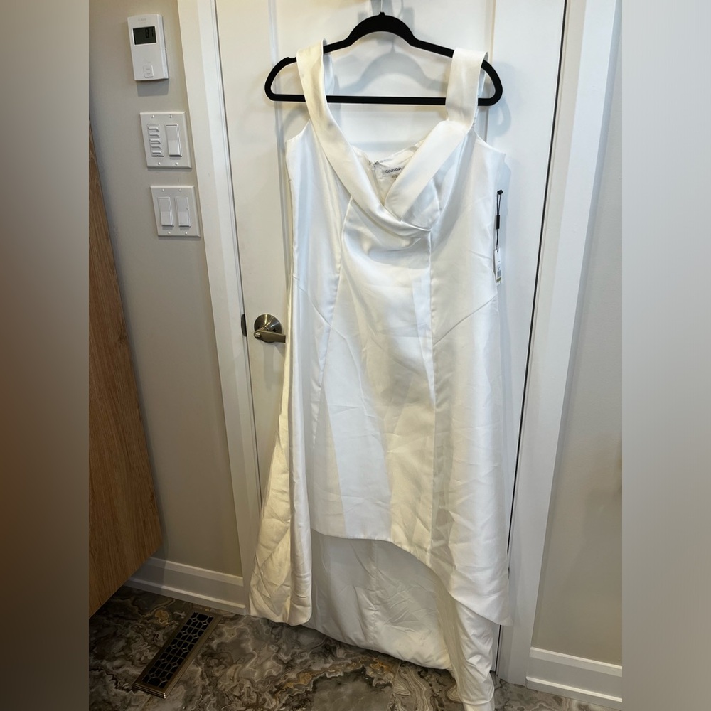 Brand new with tags. Calvin Klein white formal dress